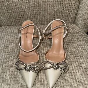 Elegant White Pointed Toe Heels with Ankle Strap